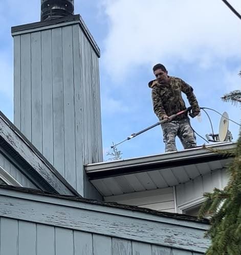 David working on an exterior roof and home improvement project