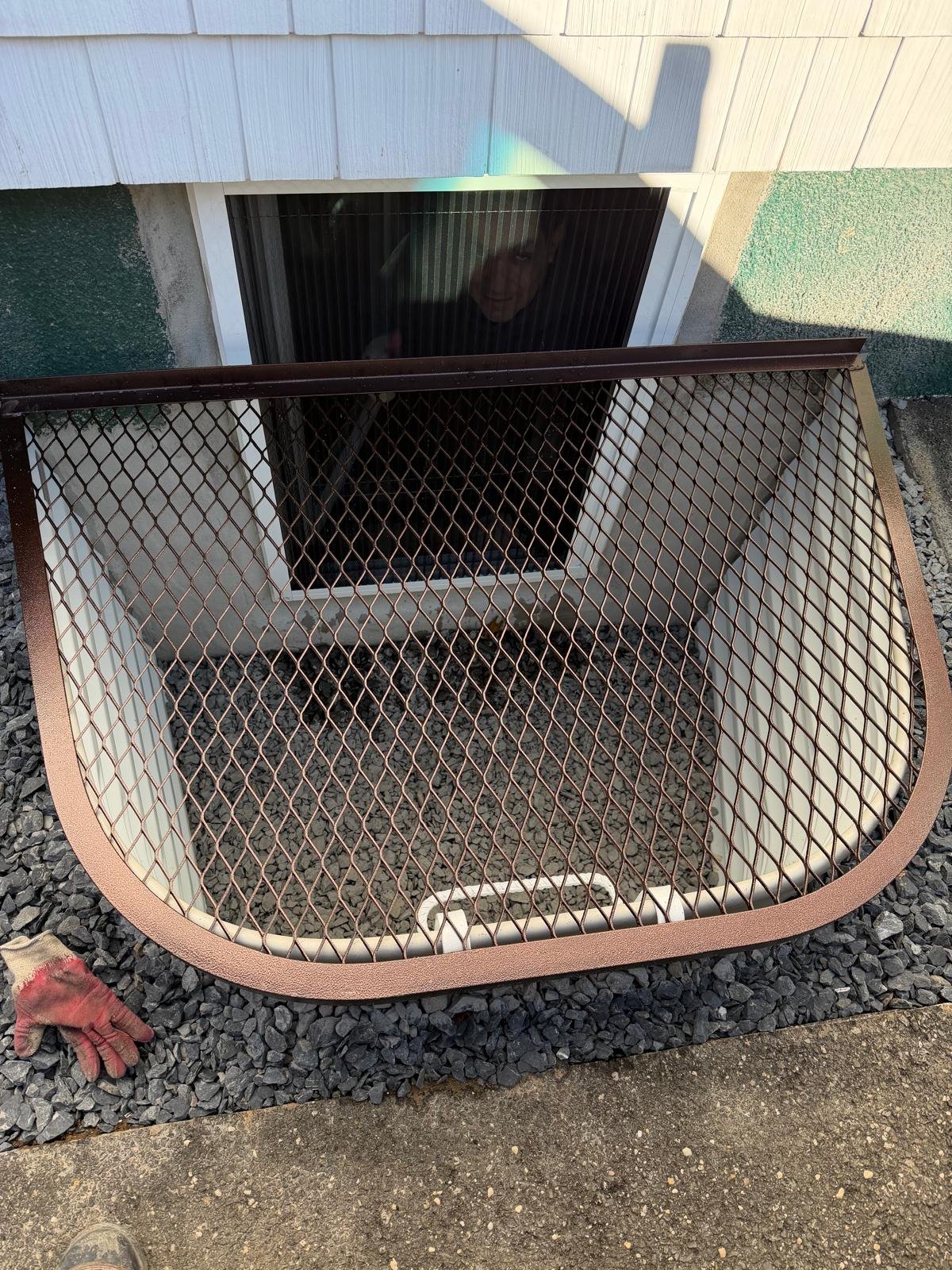Excavation and window well preparation for a basement window