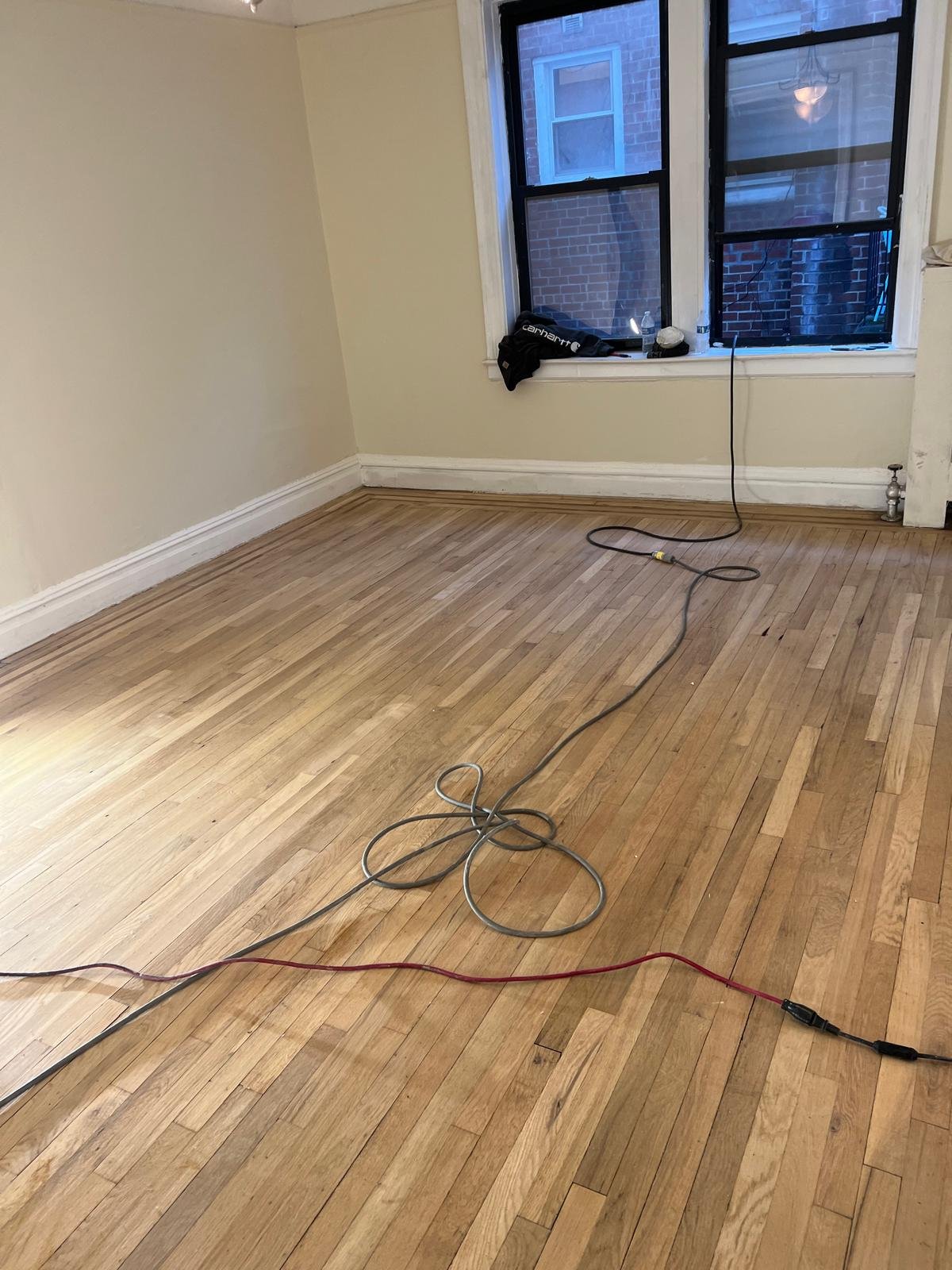 Restored hardwood floor with a fresh finish
