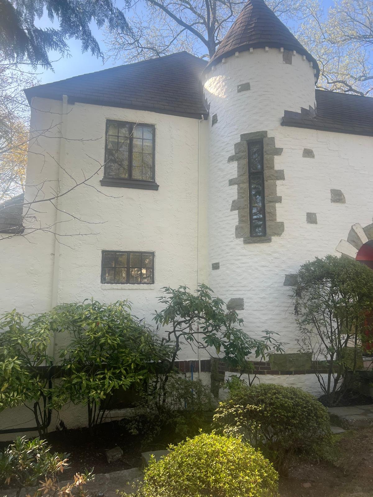 Exterior stucco repair around a home window