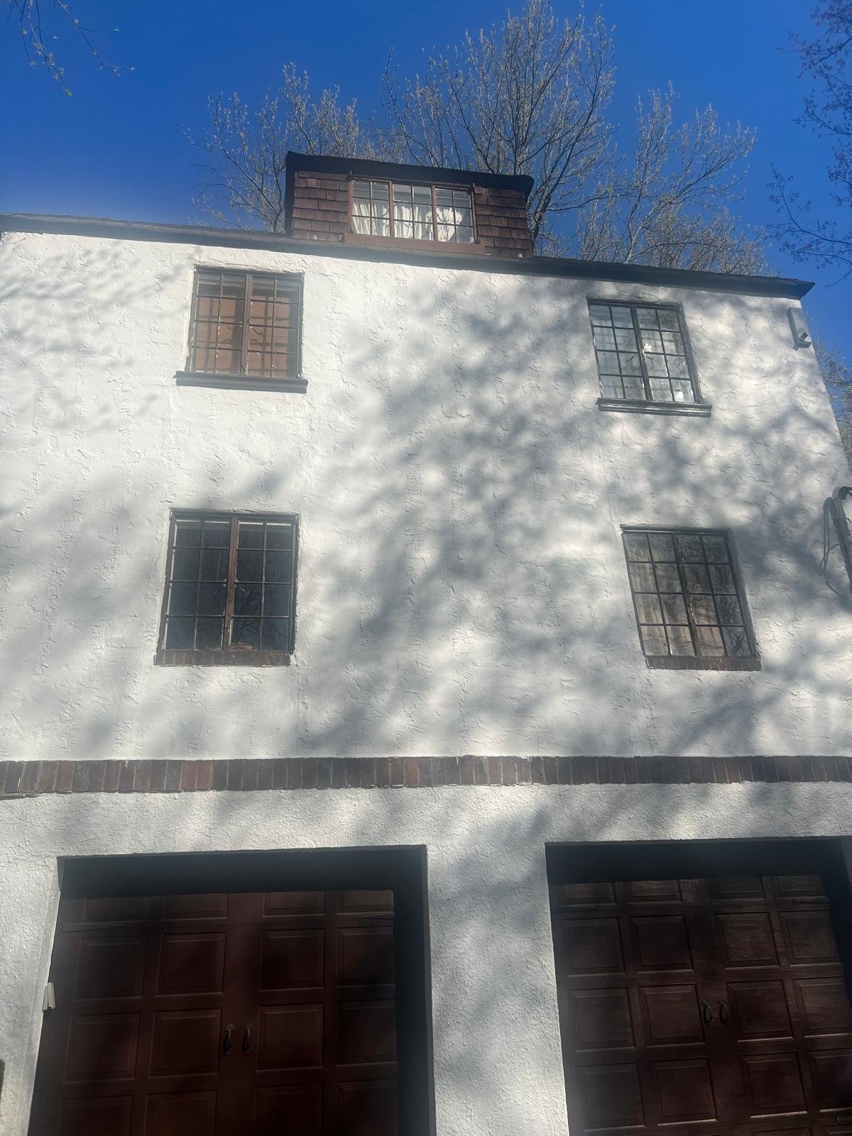 Exterior wall restoration and window finishing